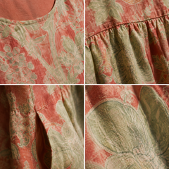 Macro detail van Beth - Robe Midi Florale met focus op de linnen textuur, koraalroze basis, saliegroene botanische print, verfijnde stiksels, tailleplooi en zakafwerking.
