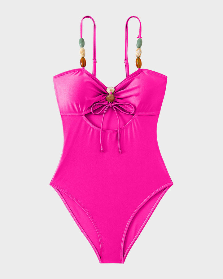 Maillot de bain élégant en satin avec perles décoratives et découpes tendance