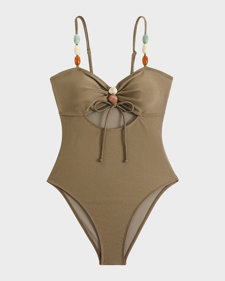 Maillot de bain élégant en satin avec perles décoratives et découpes tendance