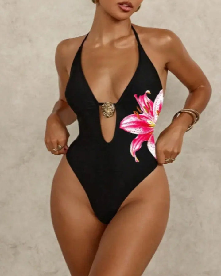 Maillot de bain une pièce à imprimé floral, décolleté plongeant en V, dos nu et col dos-nu à nouer